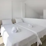 Ar *